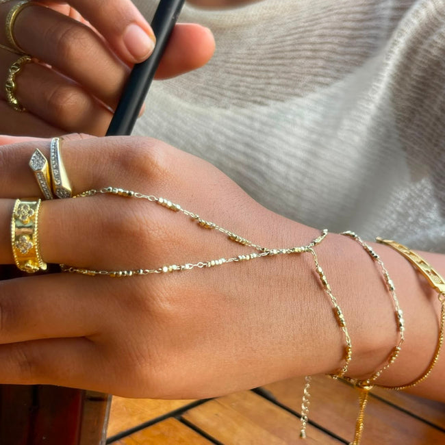 studded hand chain