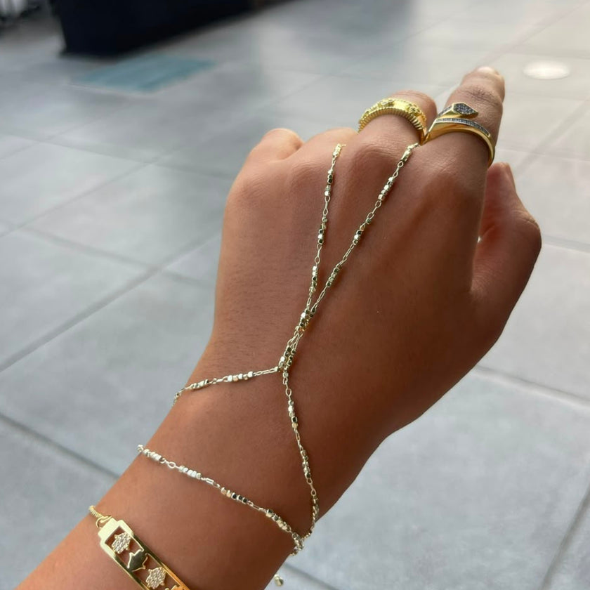 studded hand chain